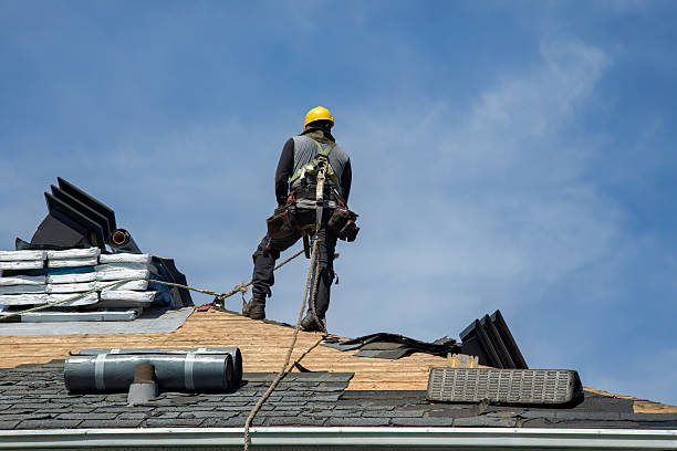 Professional Roofing technician working in Falls City, OR